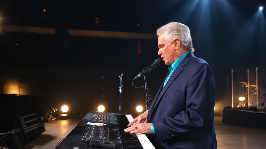 Terry MacAlmon worshipping at the piano